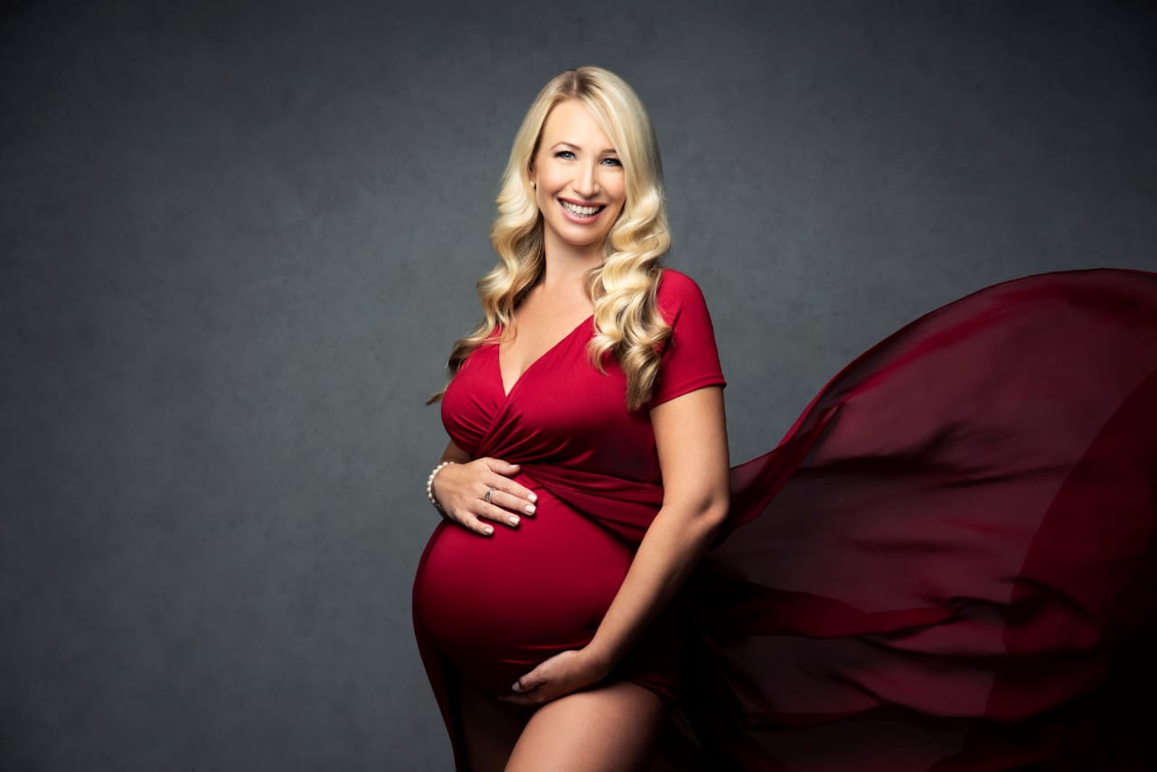 Pregnant woman in a red dress