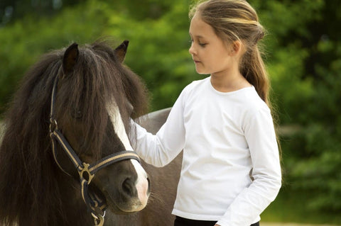 Girl with a pony