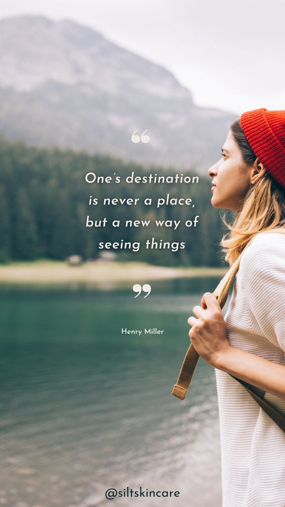 Inspirational travel quote One’s destination is never a place, but a new way of seeing things henry miller woman with backpack looks over lake and mountains