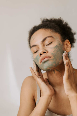 woman enjoying spirulina face mask