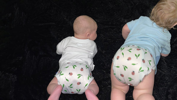 matching siblings wearing modern reusable kinder cloth pocket diaper with AWJ