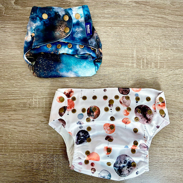 reusable diapers designed to fit babies from seven to sixty pounds or more birth to potty training
