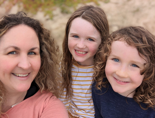 Milk Tooth family: Kath Sylvia and Louis at t he beach