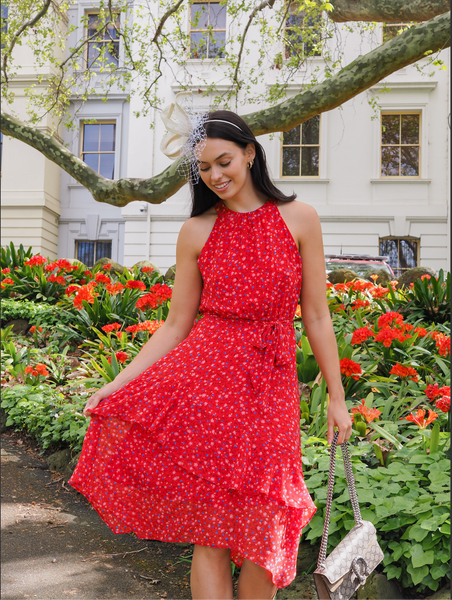 The Gambetta dress by Stella Clothing. A red floral print formal halter dress with tiered skirt