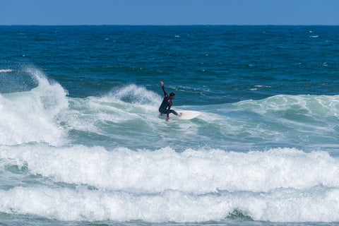 a surfer riding a wave