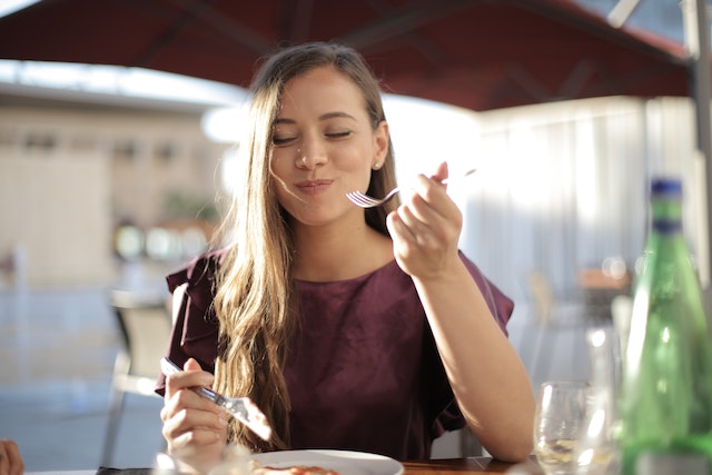 A person enjoying their meal.