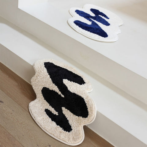 Peppery Home Sea Shell Shaped Bath Mat - beige and white clam