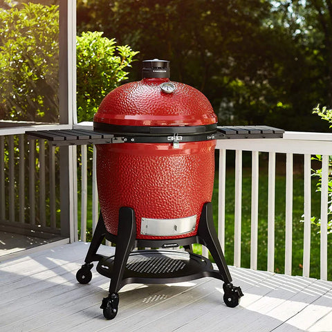 A Kamado Joe Big Joe III in a back yard ready to barbecue