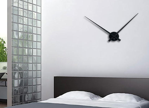 Reloj de pared de metal minimalista