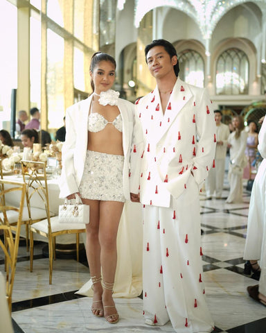 Angelique Manto & David Guison Wearing LVNA at the Dior