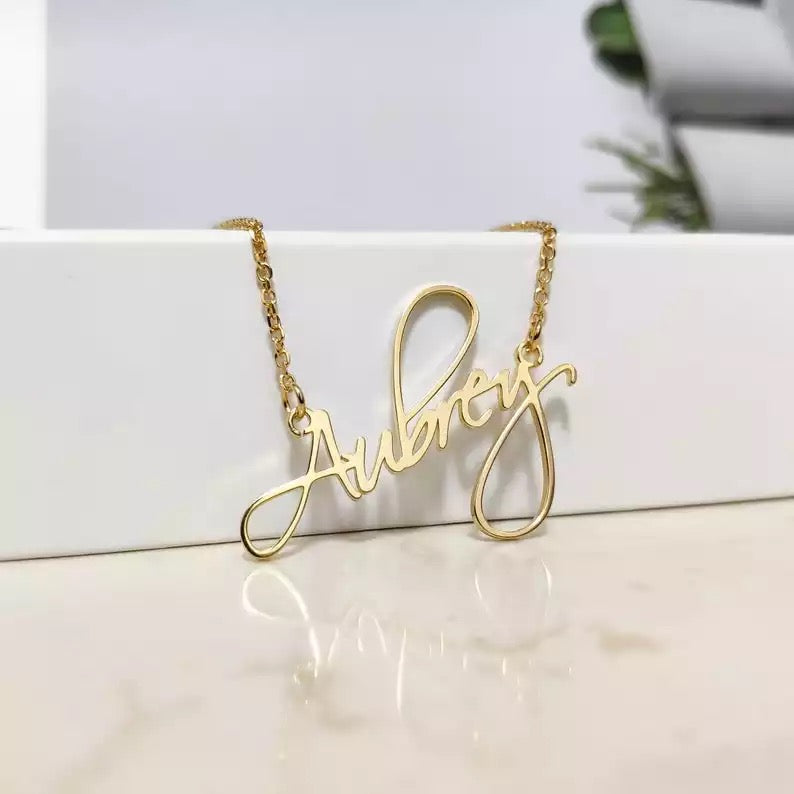 ashu name gold chain