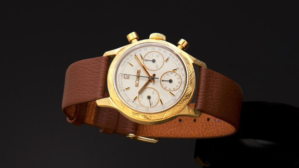 The funky gold LeCoultre Chronograph with guilloched case, bezel and lugs