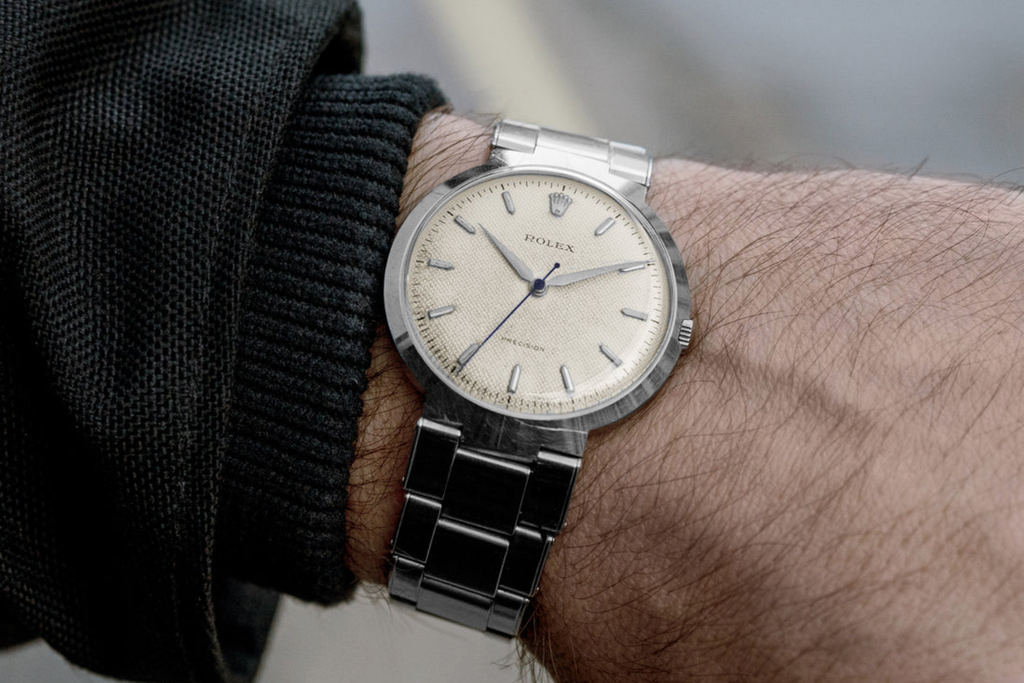 rare Rolex 9083 UFO on a wrist with white honeycomb dial