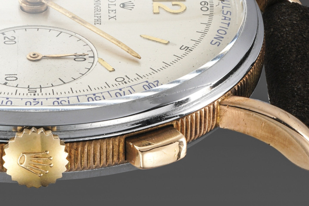 side view of the coin edge on a vintage 1950s Rolex 4062 chronograph