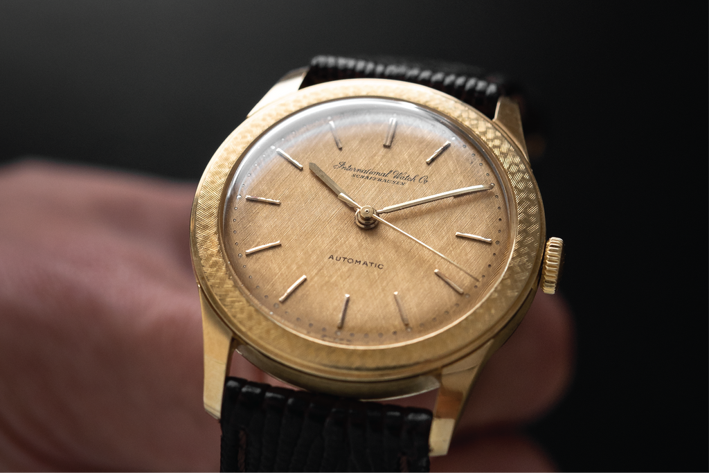 linen and bark finished golden IWC dress watch
