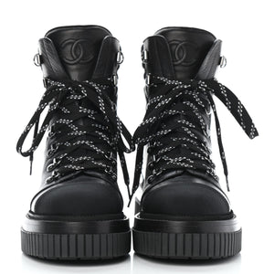 chanel cc combat boots