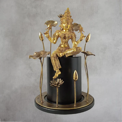 Brass Laxmi with flower by Satguru’s.