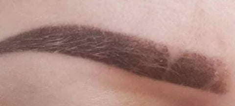 scabbing of powder brows