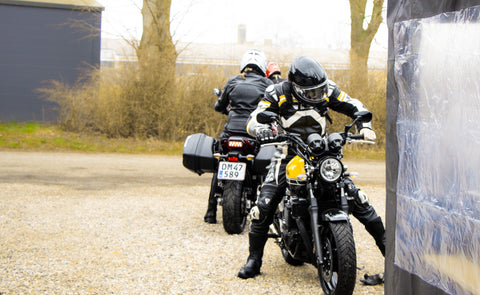 Motorcyclist on their bikes arriving at Moto Lounge celebration