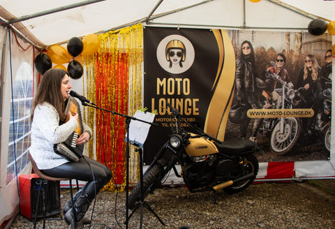 Camille Grey entertained and sang to motorcyclist at the Moto Lounge event