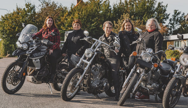 Five women with motorcycles