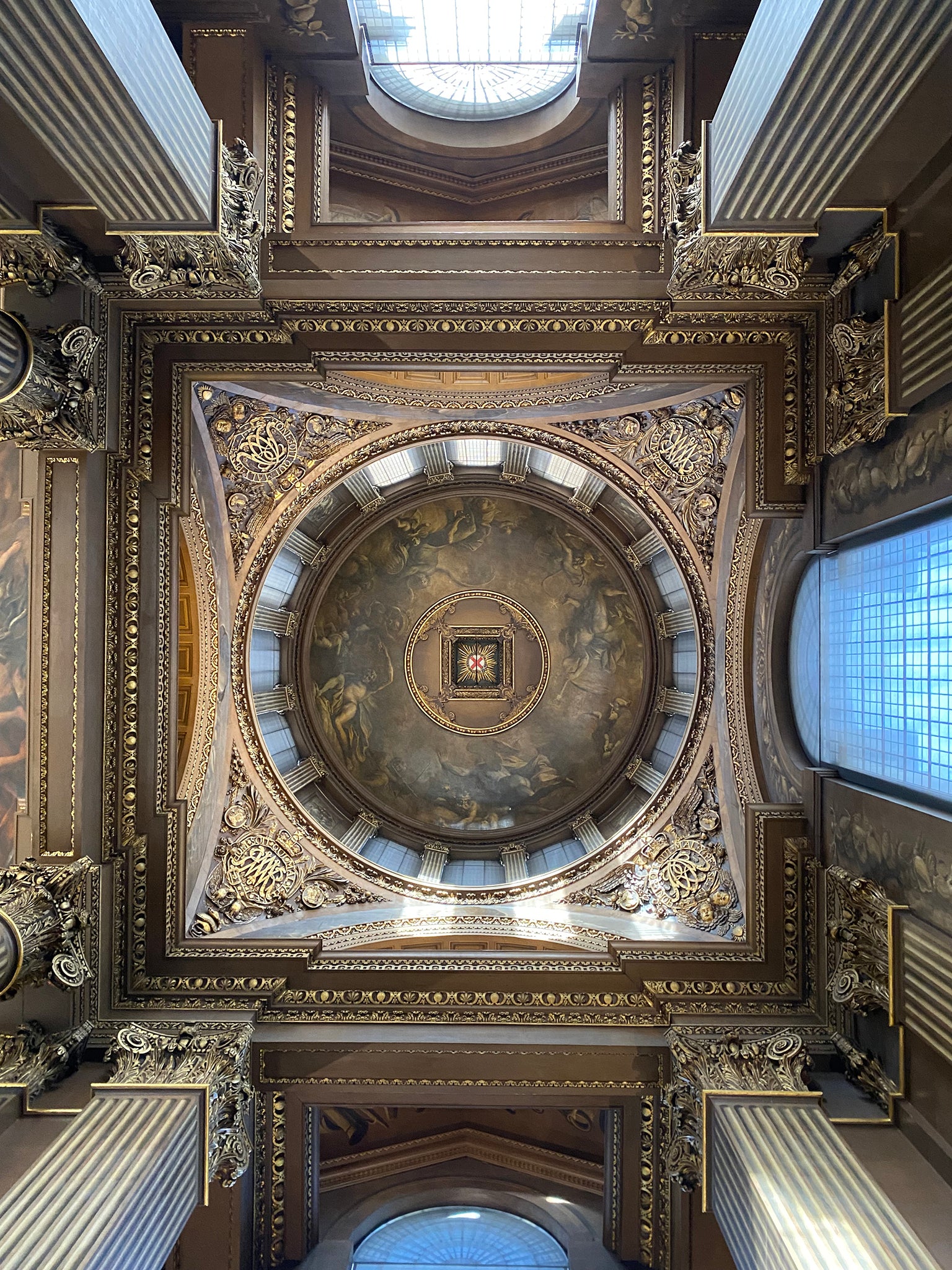 A photo of the ceiling of the entrance hall looking directly up