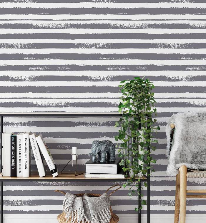 Distressed gray-white striped wallpaper with weathered paint texture