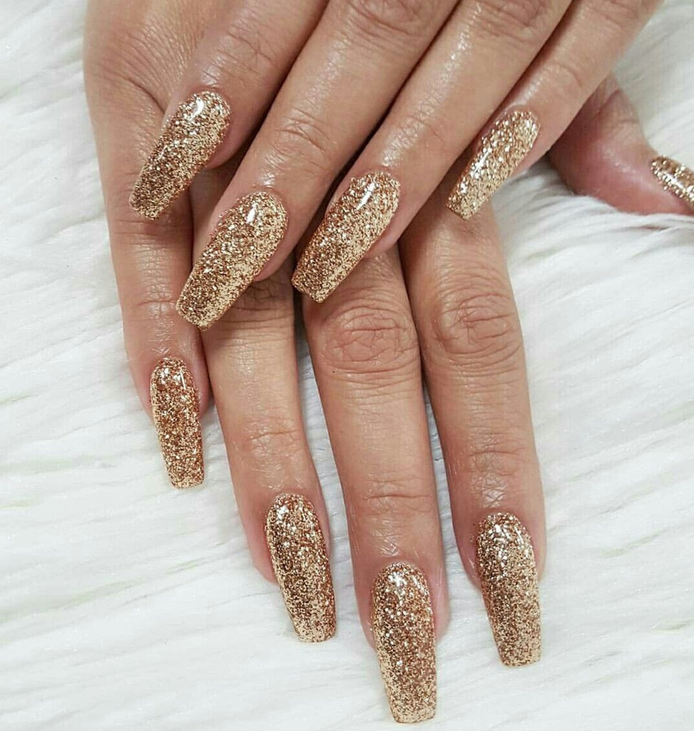 Gold glitter gel nail polish