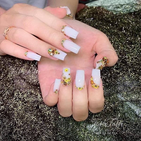Milky white color nail with rhinestones