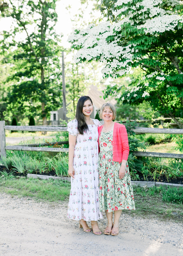 Lan and Angela wearing dresses named after them