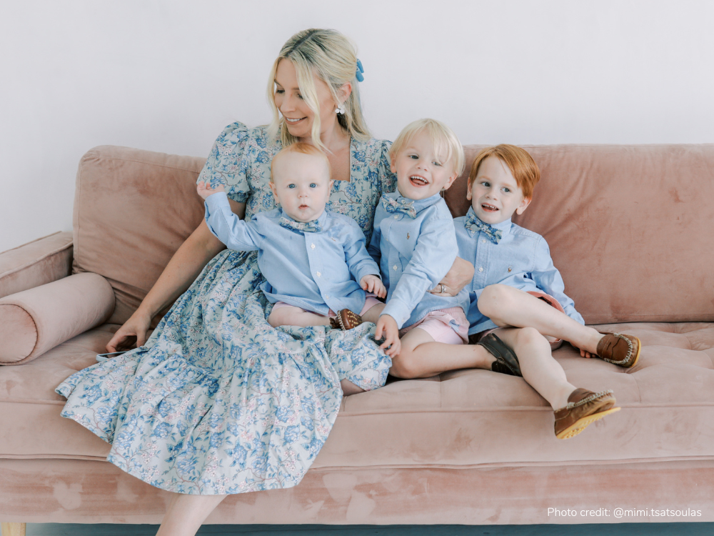 Mom and little boys in matching feminine nursing-friendly dress and bow ties 