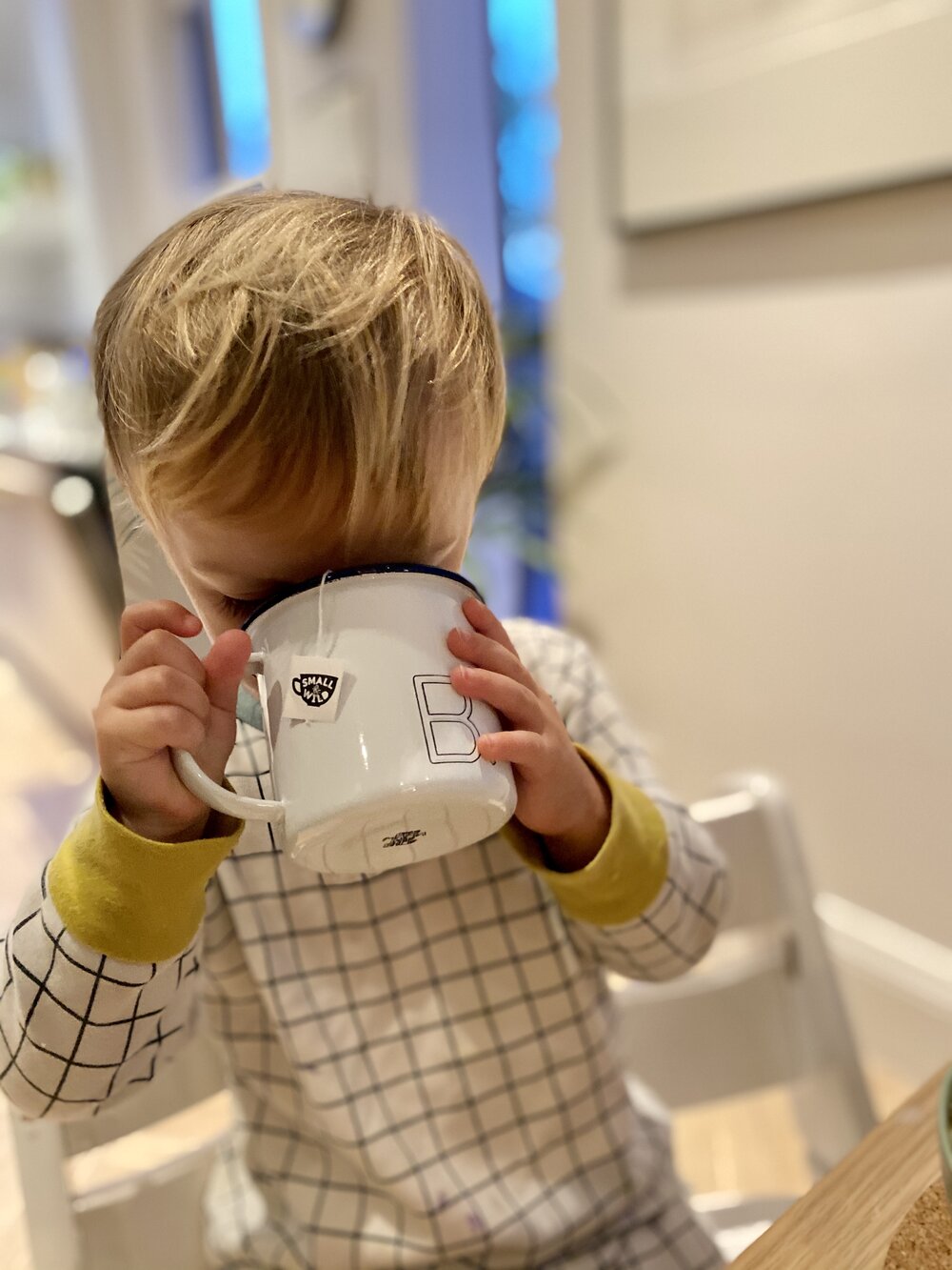 toddler drinking herbal tea