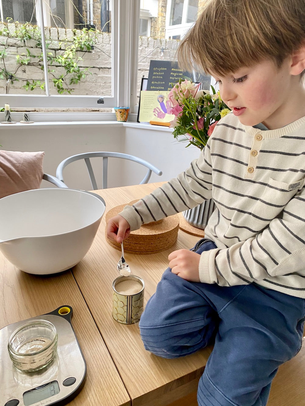 weighing ingredients for hot cross buns