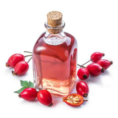 stock image of rosehip oil and rosehips