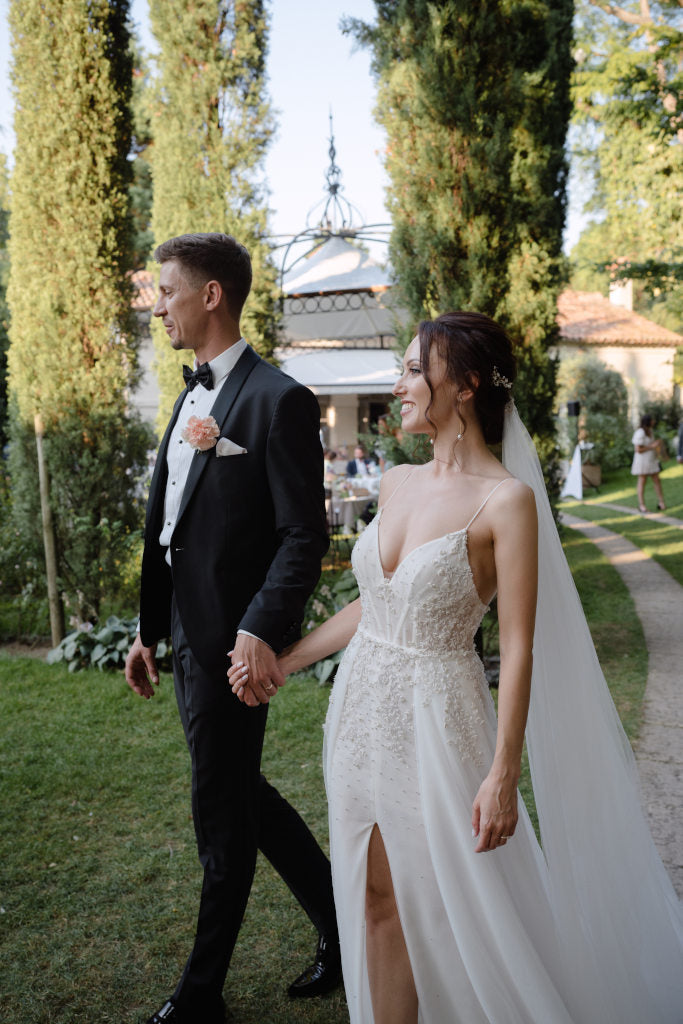 Real Bride Mikaella wearing a couture wedding dress, designed by Karin Rom