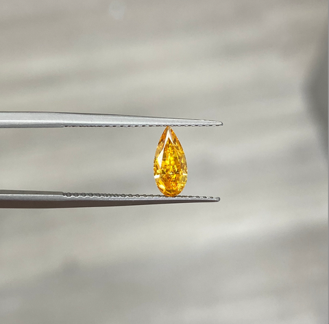 half carat fancy vivid orange diamond