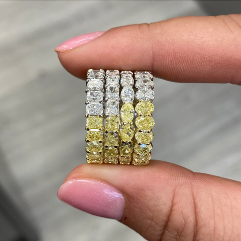 diamond eternity bands with half yellow and half diamonds in different diamond cuts