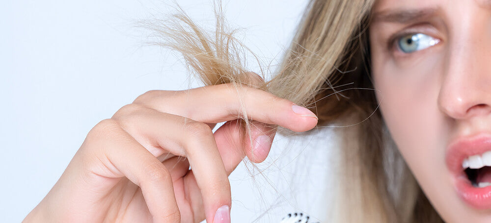 woman frustrated with split ends