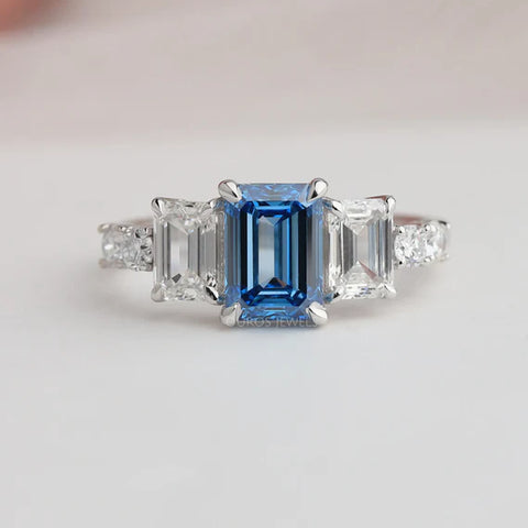 [This lab-diamond engagement ring is made of a blue emerald diamond cut ring with side stone emerald and round diamonds in 14k white gold. Start Shopping now!]-[ouros jewels]