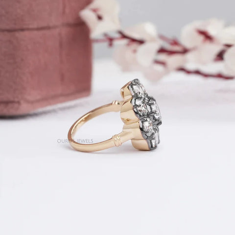 White lab-grown diamond promise ring with black and yellow gold coating that looks unique and special on the finger.