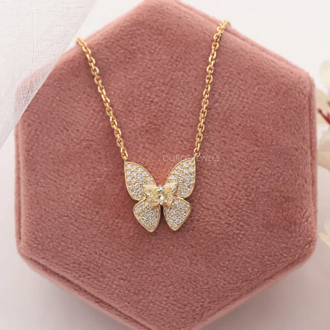 Radiant yellow gold butterfly-shaped diamond pendant for women, a symbol of grace and transformation. This enchanting accessory adds a touch of whimsical elegance to any ensemble, capturing the beauty of nature in a timeless and sophisticated design.