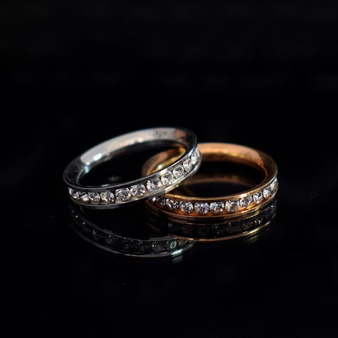 Diamond matching bands in rose gold and white gold for couples to be chosen for love's sign.