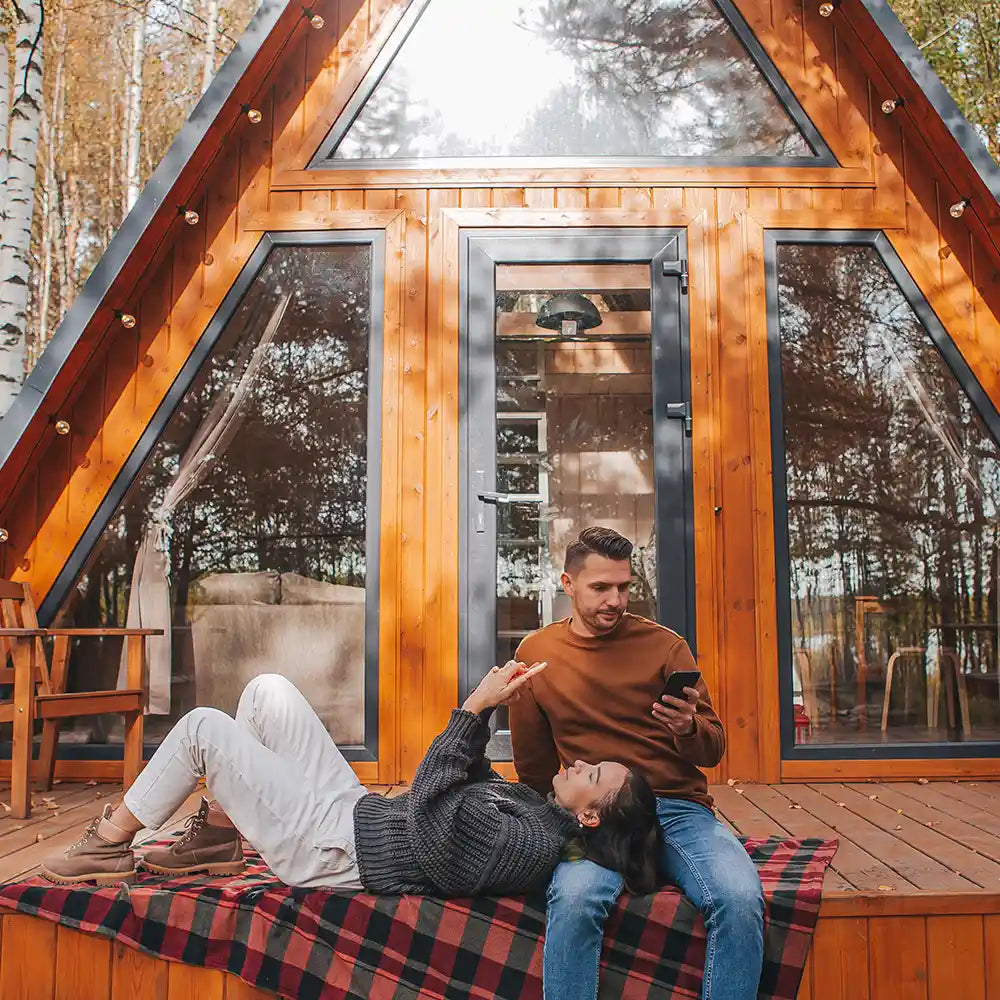 Man and woman spending weekend as best proposal time at cozy cabin