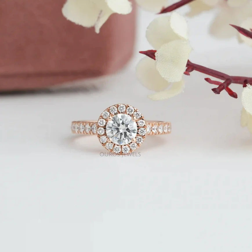 [Round cut ethical lab grown diamond halo engagement ring in 14KT rose gold with shared surface prong setrings]-[ouros jewels]