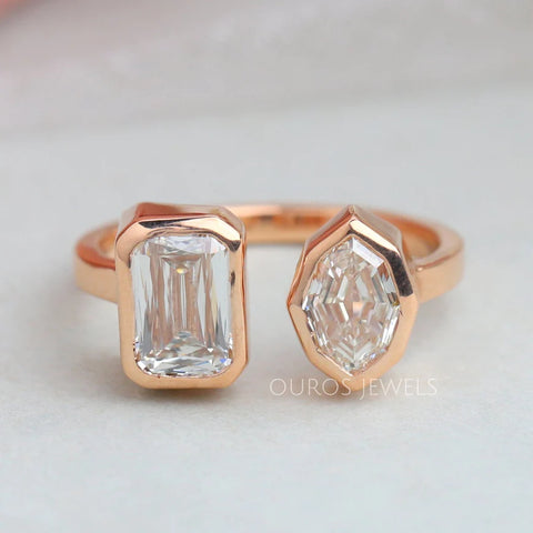 1.55 carat weight criss and 1.05 step moval cut diamond Toi et Moi ring in 18KT rose gold metal.