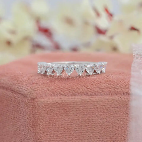 Modern heart shaped lab diamond half eternity wedding band made with the white gold metal.