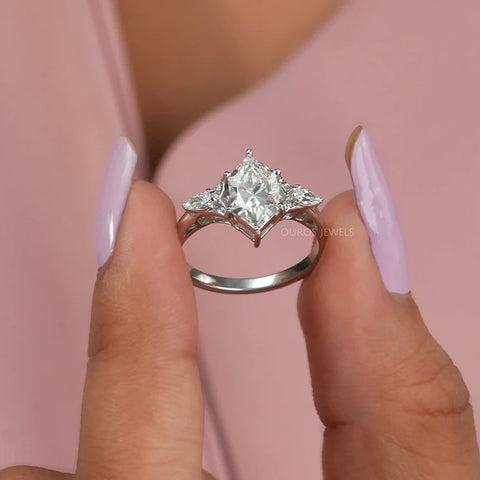 Elegantly crafted white gold engagement ring featuring a Dutch marquise diamond in a high prong setting. It is statement of timeless beauty and refined craftsmanship.