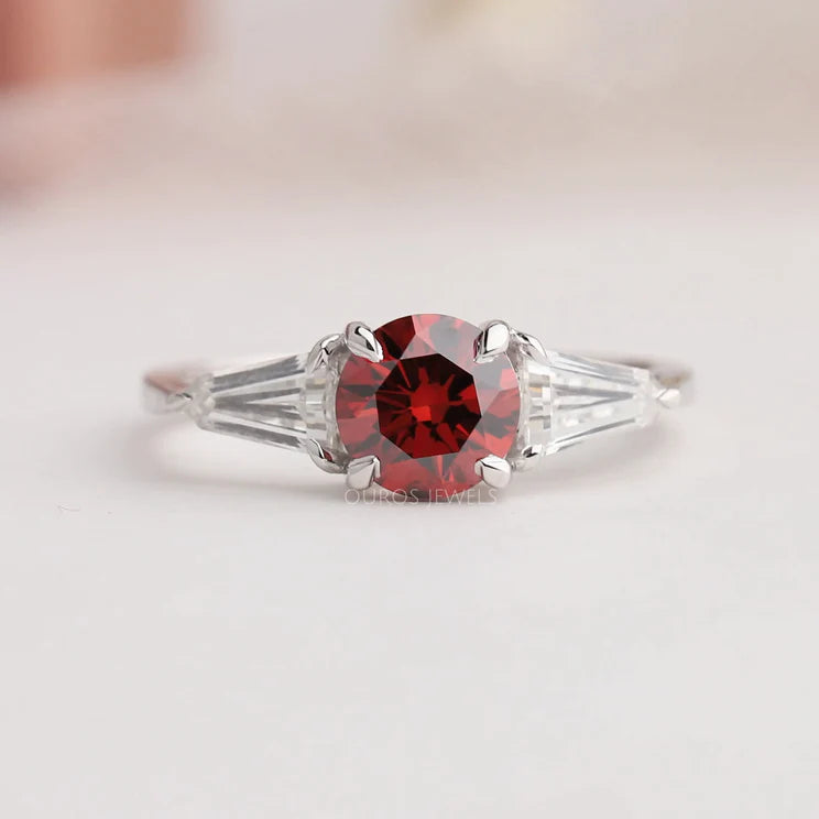 0.85 carat weighted red colored round and 0.74 CTW bullet cut lab-grown diamond engagement ring with 14KT white gold and VS clarity