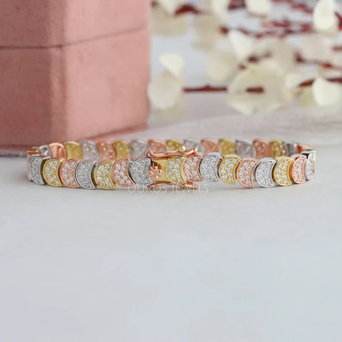 [Round diamond tennis bracelet with a yellow, rose and white gold tones with a clasp settings]-[ouros jewels]