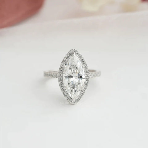 3.00 carat marquise cut lab-grown diamond halo promise ring with white gold metal finish.